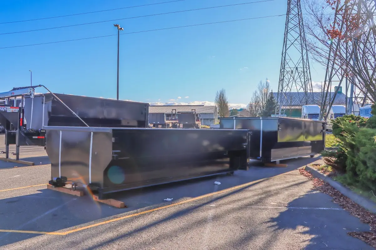 Roll-off dumpster ready for waste disposal at job site for 15 Yard Dumpster Rental in Flagler Beach